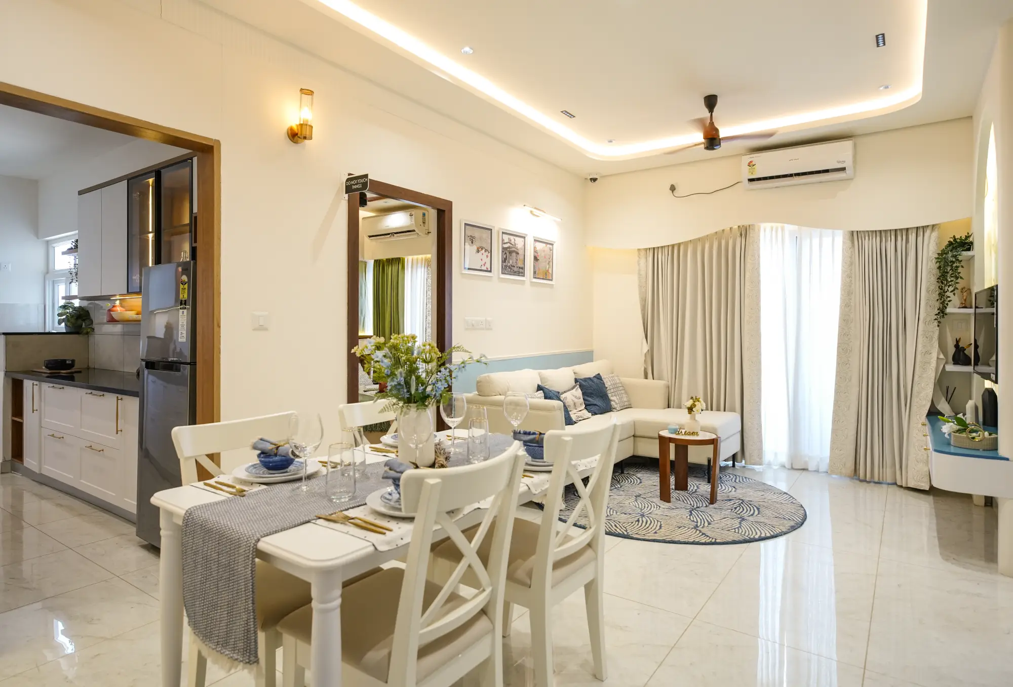 Living and dining in The Azure Nest, a Nuvora home