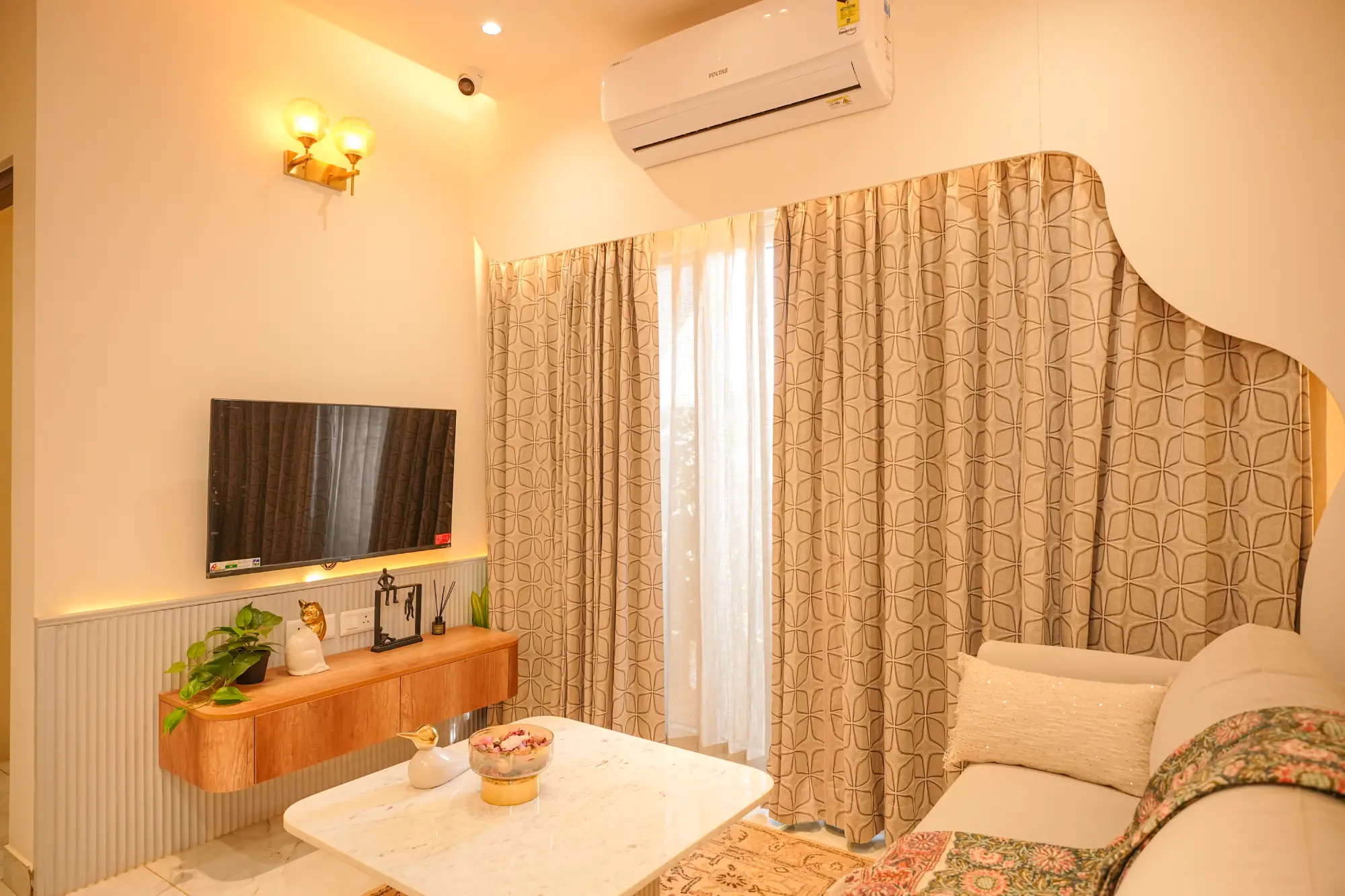 Living and dining in The Curvana Residence, a Nuvora home